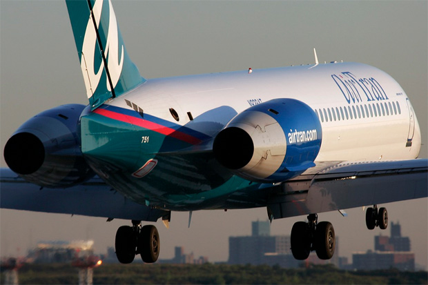 File photo of AirTran 717 N938AT about to touch down at LaGuardia. Photo by Phil Derner