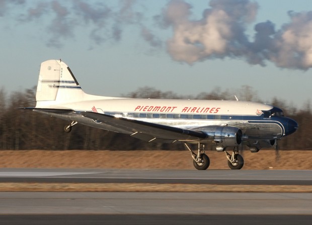 Now THAT is how you introduce a new runway! Charlotte's new runway 36L/18R receives its first rubber from this gorgeous DC-3. (Photo by Jay Selman/www.AirlinersGallery.com)