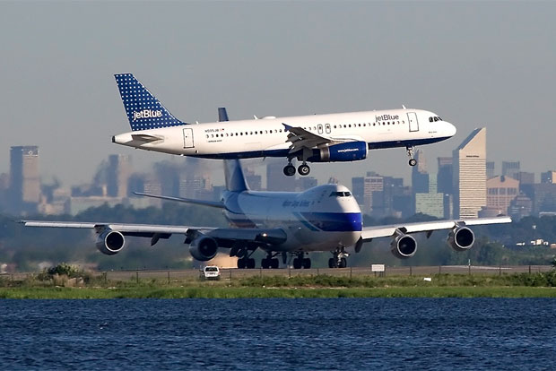 Setting down on JFK's runway 4L in front of the NYC skyline. Photo by Eric Dunetz
