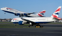 British Airways Boeing 747 and 777s cross paths at Boston's Logan International Airport. (Photo by Eric Dunetz)